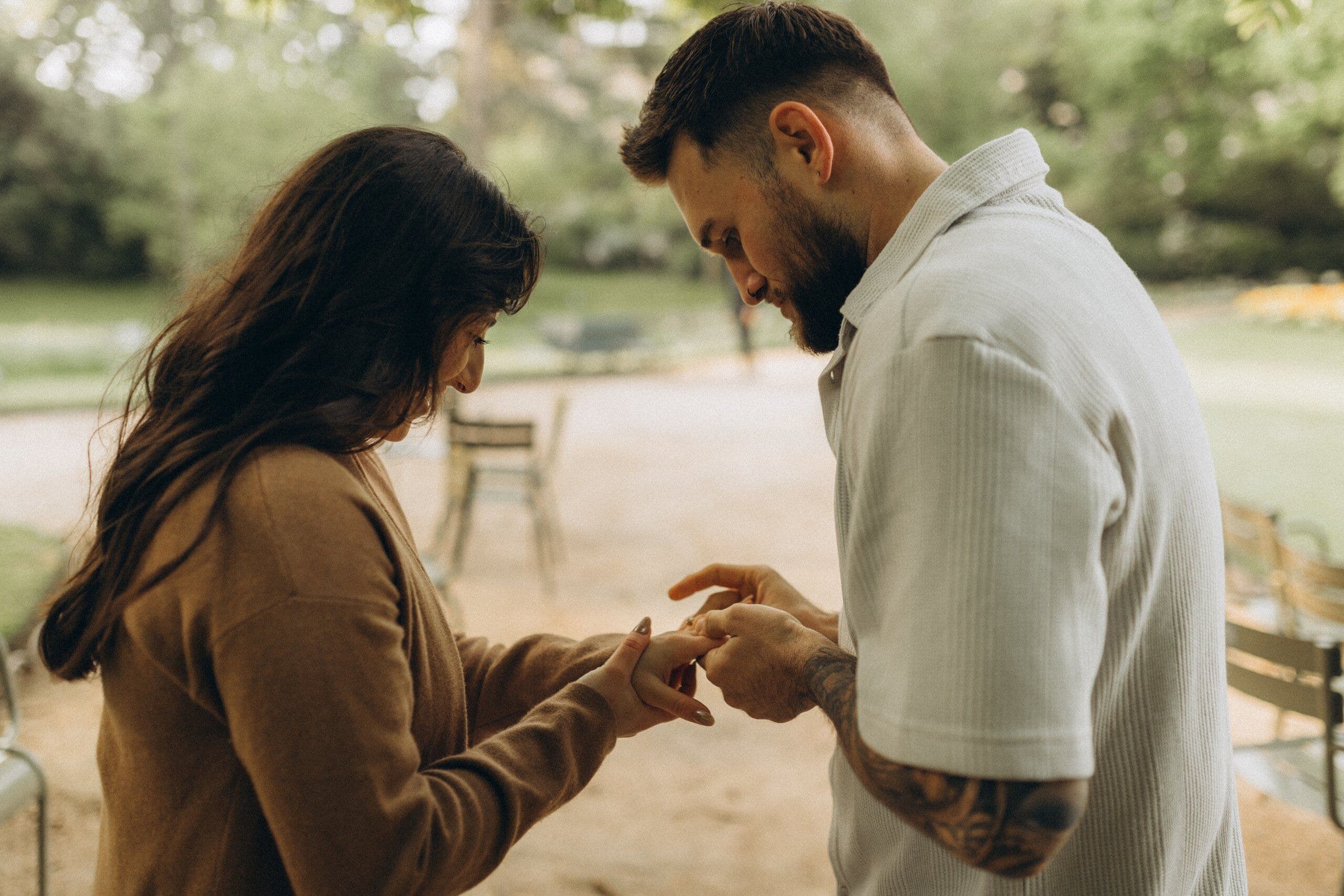 Engagement ring slipped on her finger after a proposal in the Luxembourg Gardens, Paris